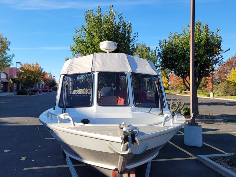 Front view of North River fishing boat with new top designed and installed by James Boat Fiberglass and Upholstery, Dixon, CA